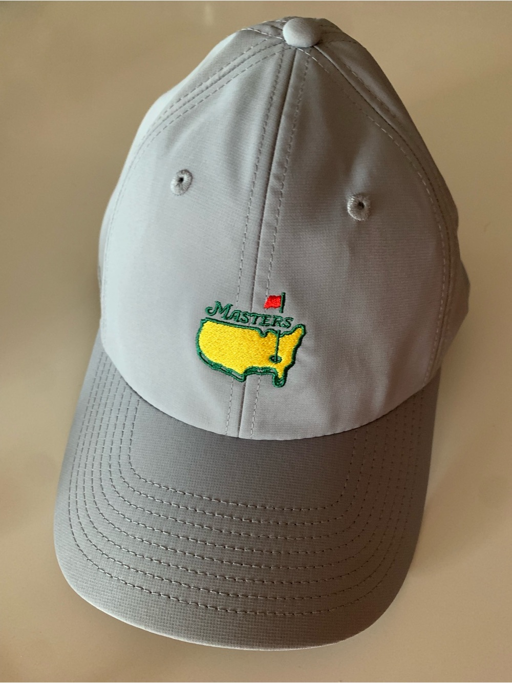 Masters American Needle Hat with Yellow Logo and Red Flag